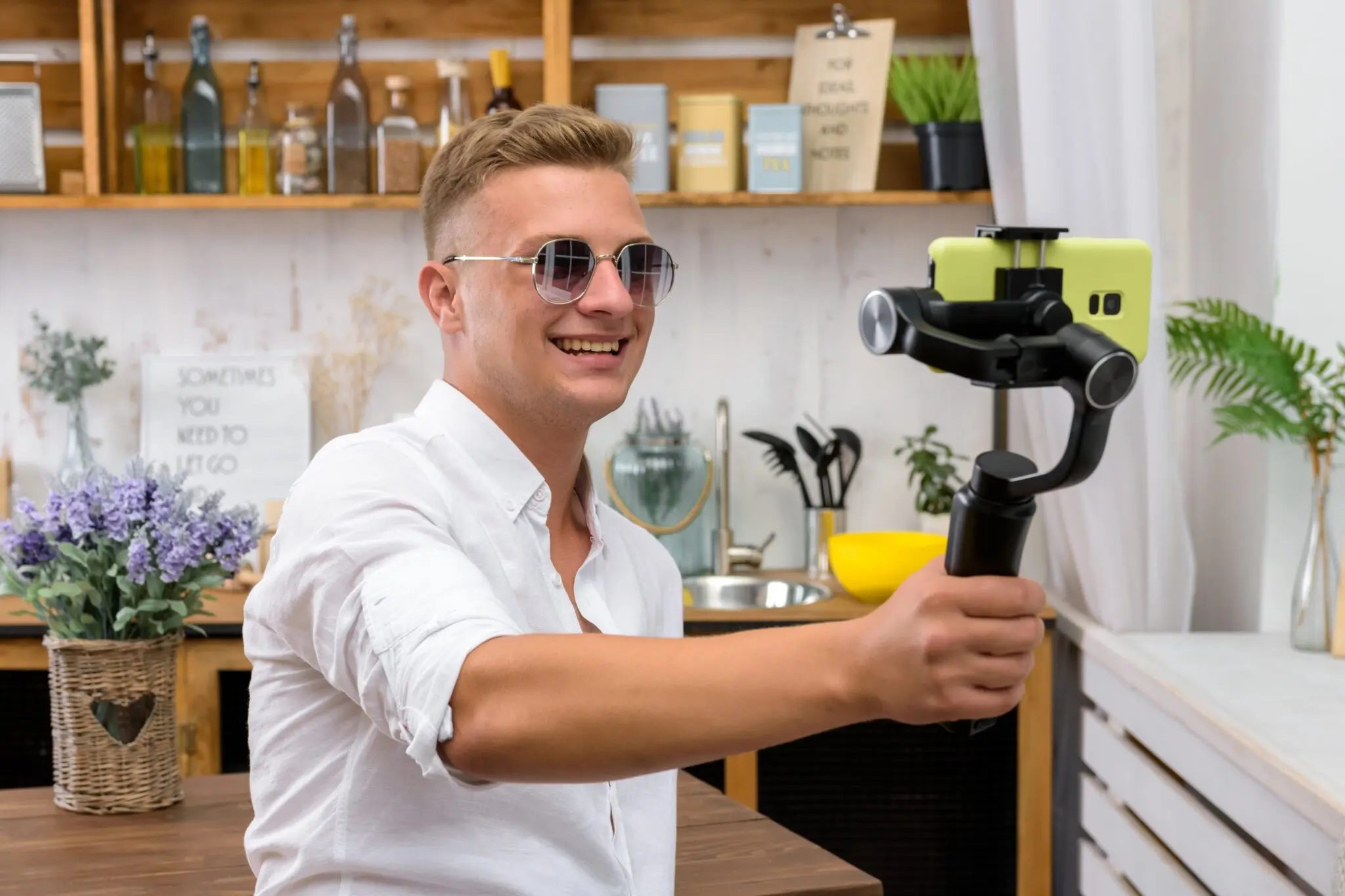 Young,Handsome,Guy,Filming,A,Video,Blog,On,A,Mobile