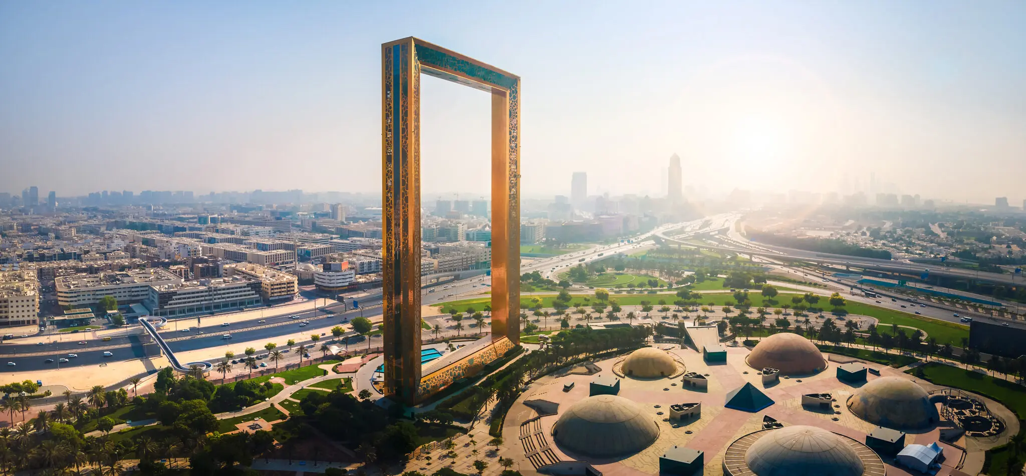 Dubai, United Arab Emirates - September 11, 2021: Aerial view of Dubai Frame near downtown with the view of old Dubai skyline in the UAE . The frame is 150 meters high and 93 meters wide and its new Dubai attraction