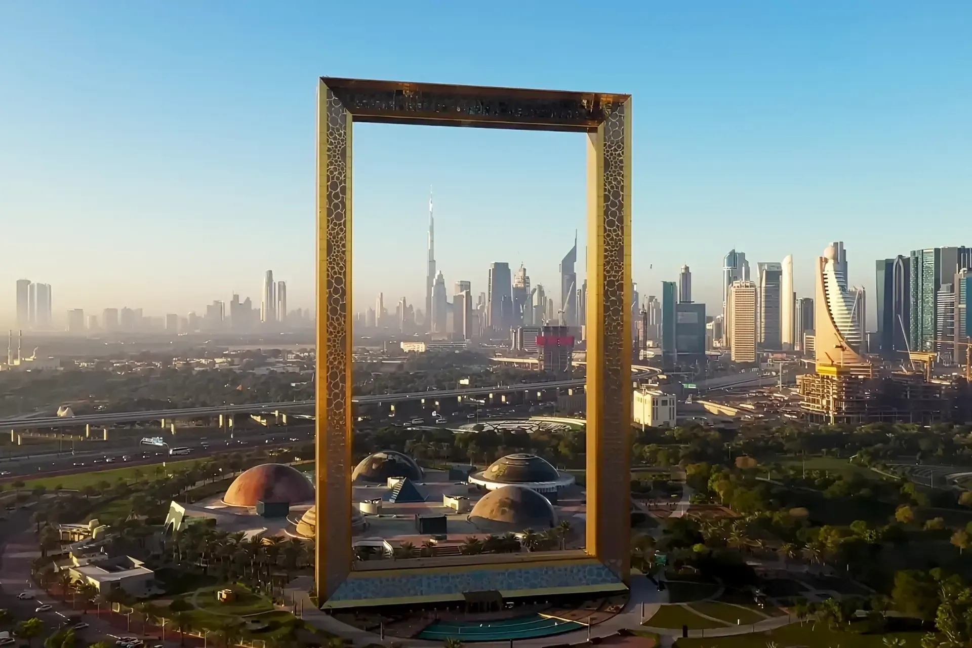 Dubai Frame with city skyline background.