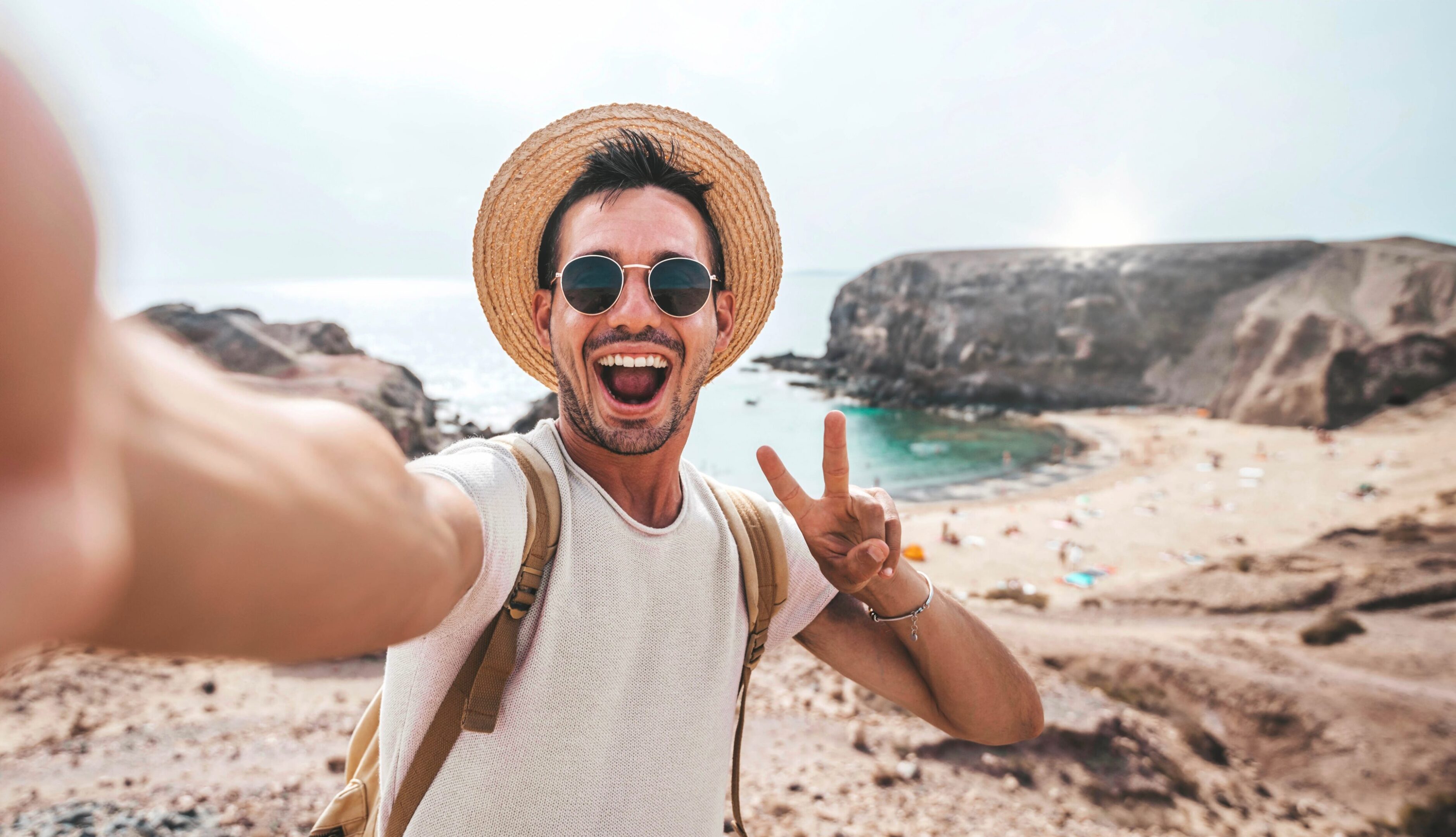 Handsome,Man,Wearing,Hat,And,Sunglasses,Taking,Selfie,Picture,On