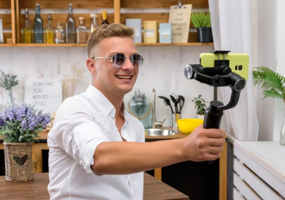 Young,Handsome,Guy,Filming,A,Video,Blog,On,A,Mobile