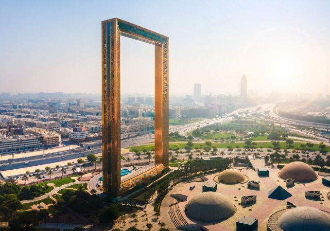 Dubai, United Arab Emirates - September 11, 2021: Aerial view of Dubai Frame near downtown with the view of old Dubai skyline in the UAE . The frame is 150 meters high and 93 meters wide and its new Dubai attraction